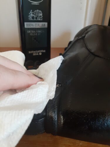 Rubbing Oil into a Leather Boot